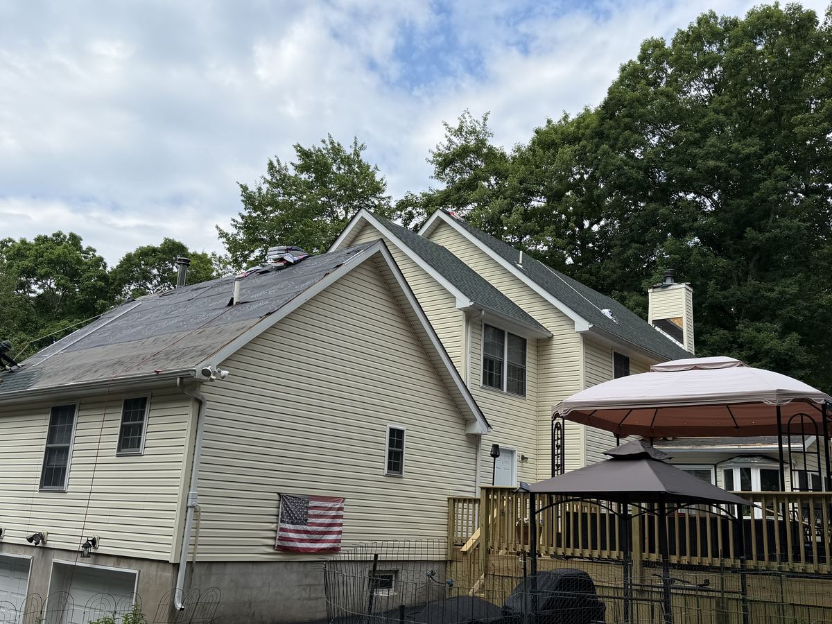 Weather-tight underlayment installed ahead of the new shingles